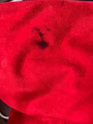 Removing Black Stains on a Red Suede Skirt