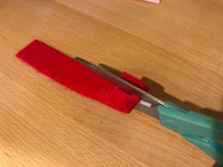 Easy Felt Flowers - fold up one end and cut a slit, but not up to the end