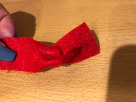 Easy Felt Flowers - poke the end into the closest hole and pull taut