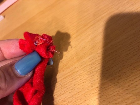 Easy Felt Flowers - roll tightly to create the rose center, keep rolling and adding glue at each turn