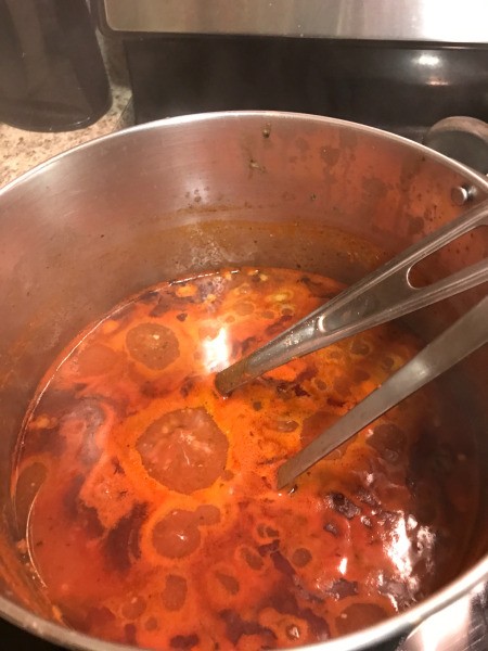 tomato sauce simmering in pan
