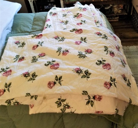 A king sized comforter that has been deconstructed and saved for reuse.