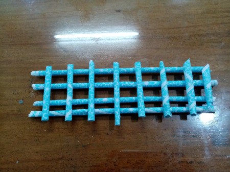 How to Make Paper Flower Wall Decor - align the short sticks over the 4 horizontal ones and glue in place