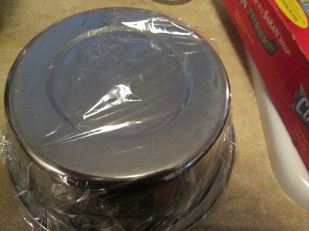 How to Make a Stiffened Doily Bowl - cover molding bowl with plastic wrap