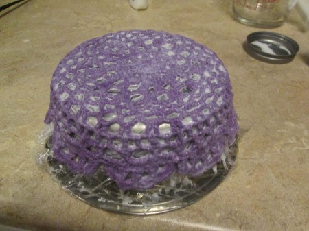 How to Make a Stiffened Doily Bowl - press doily in place on the outside of the bowl