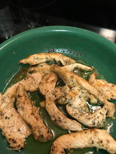 cooked chicken strips in pan