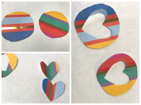 DIY Paper Towel Roll Kaleidoscope - trace a circle on the scrapbook paper for each kaleidoscope and then cut out the finder area in the center, here a heart shape