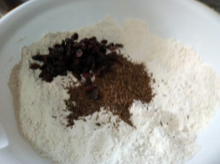 adding seeds to dough