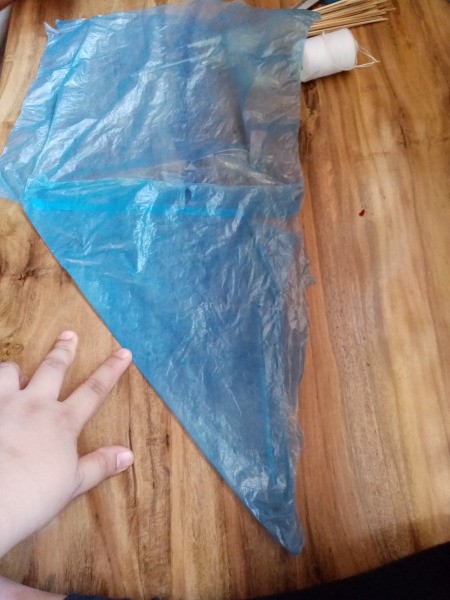 How to Make a Mini Kiddie Kite - fold diagonally to create a triangle