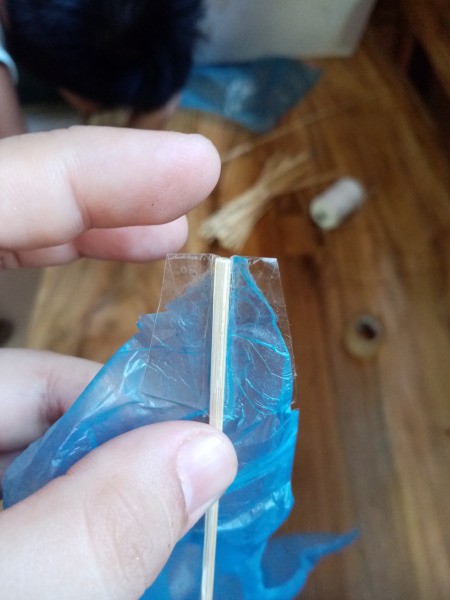 How to Make a Mini Kiddie Kite - attach the ends of the sticks to the corners of the diamond