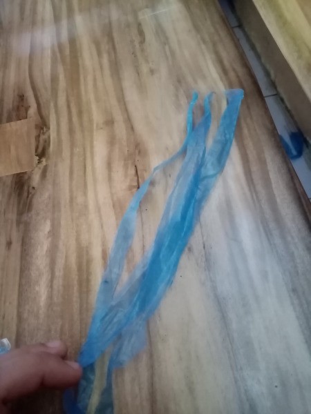 How to Make a Mini Kiddie Kite - cut strips from the leftover parts of the bag