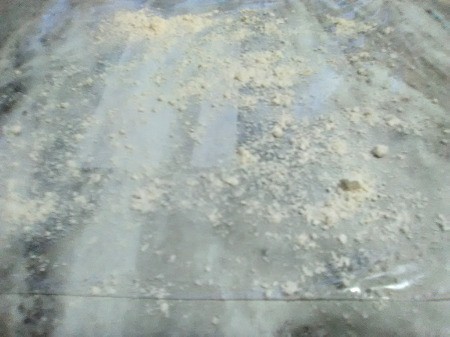 flour on 1/2 plastic bag