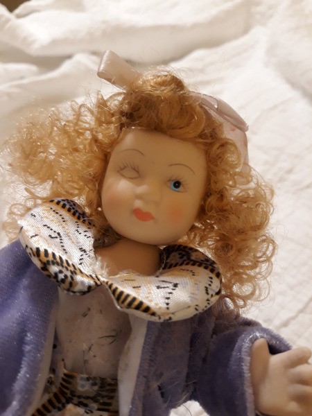Identifying Two Small Porcelain Dolls