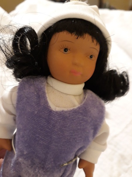 Identifying Two Small Porcelain Dolls