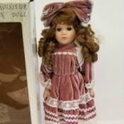Value of a Seymour Mann Doll - doll next to box
