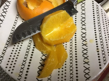 cutting orange in segments