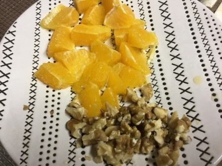 Orange pieces and walnuts