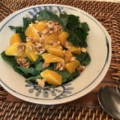 Baby Kale Walnut Orange Salad on plate