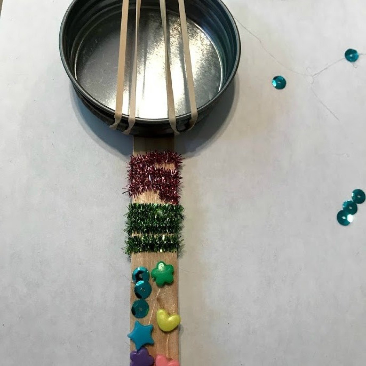 Making Toy Banjos from Jar Lids ThriftyFun