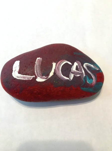 Photo Holder Rock - flat oval rock with child's name painted on it