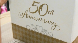 Box with 50th Anniversary written in gold.