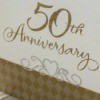 Box with 50th Anniversary written in gold.