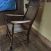 Identifying a Spring-foot Rocker - chair with springs on the front two legs, woven rattan back and seat