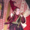 Identifying My Porcelain Doll - jester doll wearing red and maroon outfit