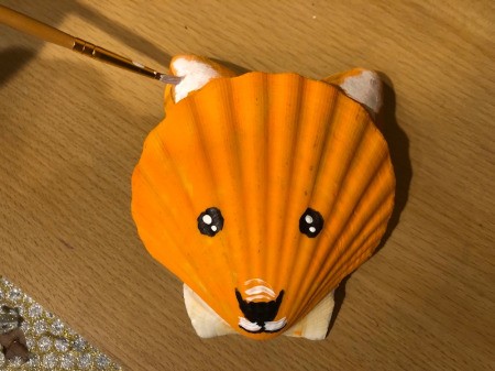 Make a Cute Fox from Shells - add fur to the insides of the ears, above the nose and around the mouth