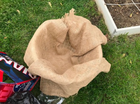 Making a Strawberry Planter from a Laundry Basket - line with burlap