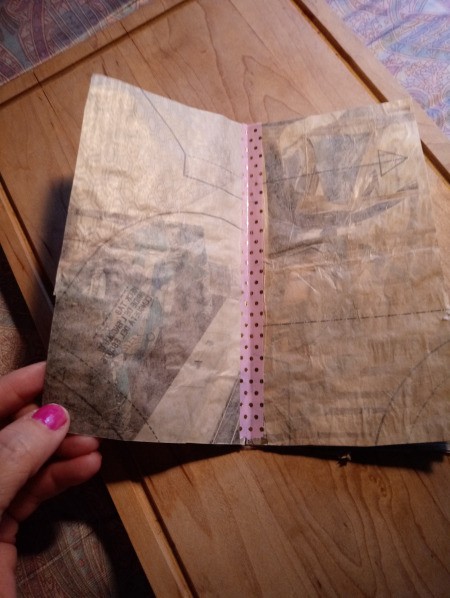 Faux Tea-Dyed Paper Using  Pattern Paper - add a strip of washi tape to the center of the page
