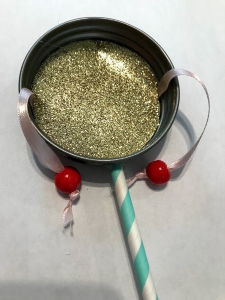 Kid Toy Rattle Drum - glue the paper circle inside the lid over the ribbon ends