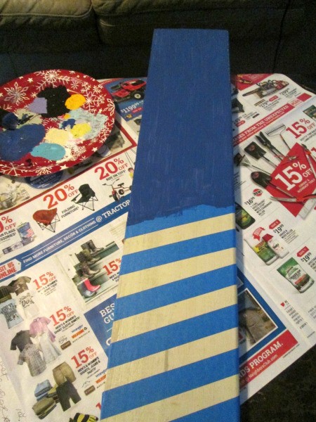Making A Patriotic Flag With Left Over Wood - paint on the blue field for the stars