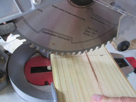Making Super Easy Wooden Bookends - cutting using a power saw