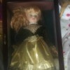 Value and Identification of a Porcelain Doll - doll in a glass fronted wooden box