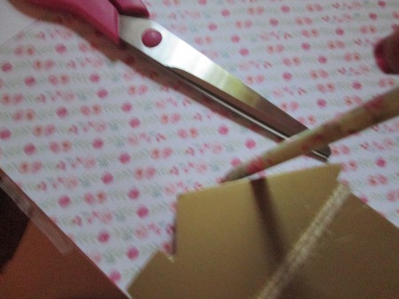 Making Super Easy Wooden Book Ends - tracing house shape onto printed floral paper