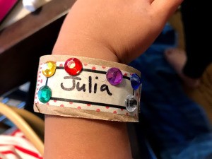 Making Paper Roll Kids' Cuff Bracelets - finished cuff bracelet on child's wrist