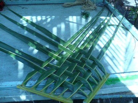 Weaving Coconut Leaf Plates - carefully move the parts together at the stem ends