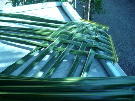Weaving Coconut Leaf Plates - view from the side
