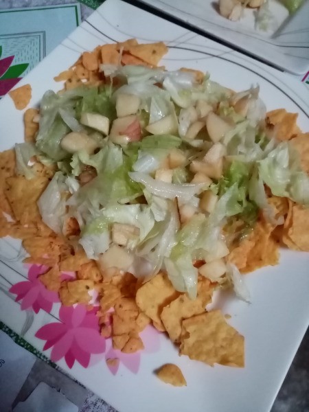 lettuce & apples on chips on plate