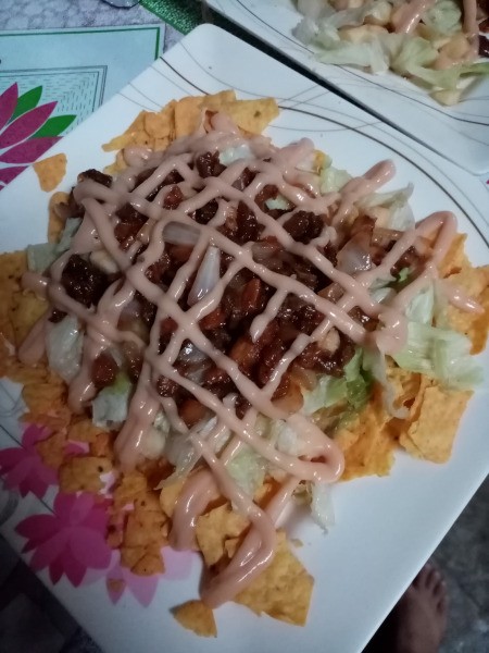 sauce dripped on nachos