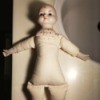 Identifying a Porcelain Doll - doll with porcelain head, arms, and legs and a cloth body