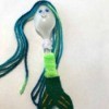 Plastic Spoon Mermaid Doll - finished doll with glitter glue details on the tail