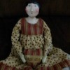 Value of a Sharon Andrews Porcelain Doll - primitive looking porcelain doll
