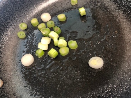 cut Scallions in pan