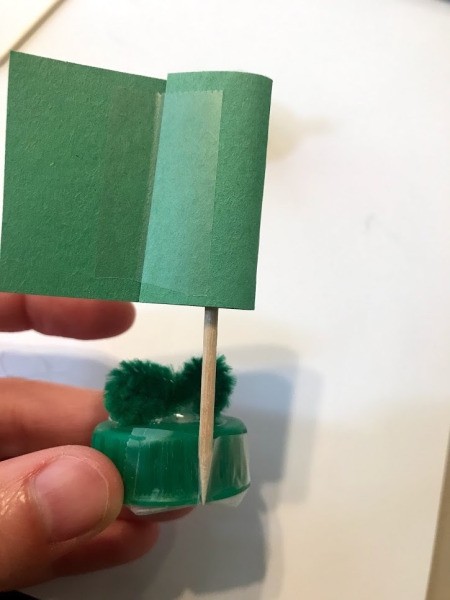 How to Make a Bottle Cap Frog Gift Tag   - tape to a toothpick and to the back of the cap