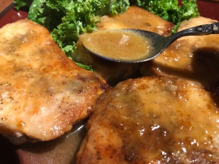 adding sauce on Pork Loin Chops
