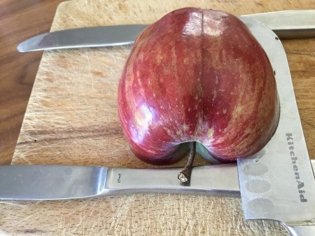 Edible Apple Swan - use the knives as a guide and cut from the outside to create a wedge