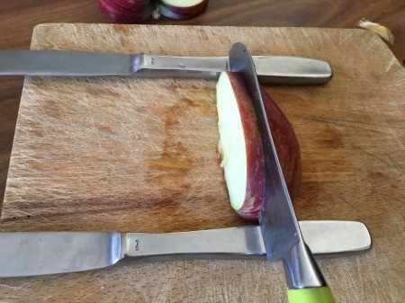 Edible Apple Swan - take a wedge and cut down 1/4 inch from the edge stopping at the knives