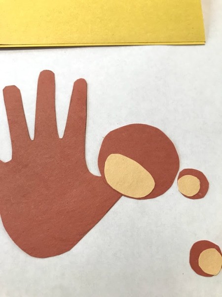 Toddler Handprint Monkey Father's Day Card - add roundish oval for lower face and then ears